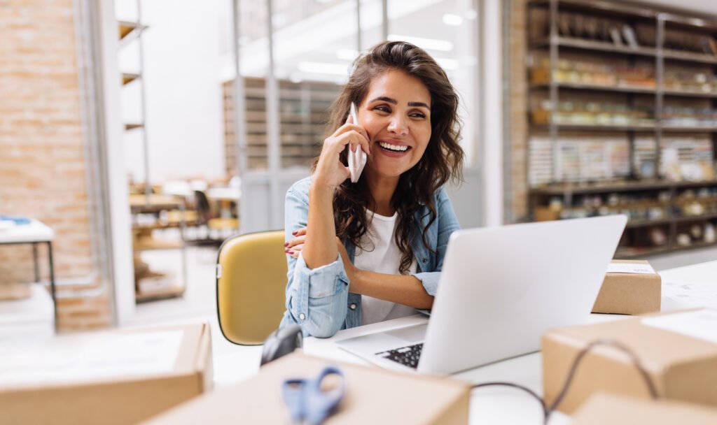 Young female entrepreneur working at her squarespace website for her small business