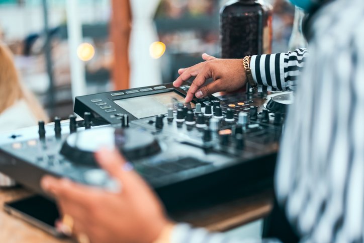 Websites for Dj's - A young dj scratching the decks