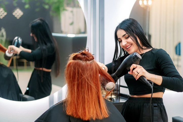 Websites for hair salons - woman getting her hair styled in a Dublin salon